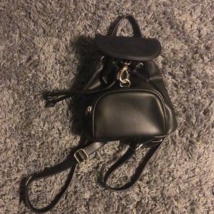 Black mini backpack from Urban Outfitters